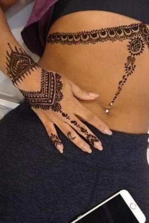 black blue henna tattoo designs on hand and stomach