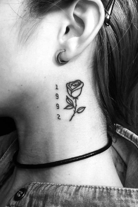 flower tattoo on side neck
