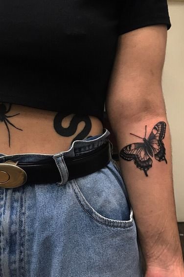 arm butterfly tattoo for females