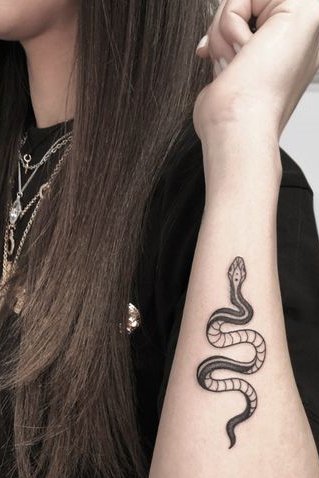Snake tattoo on foreaam
