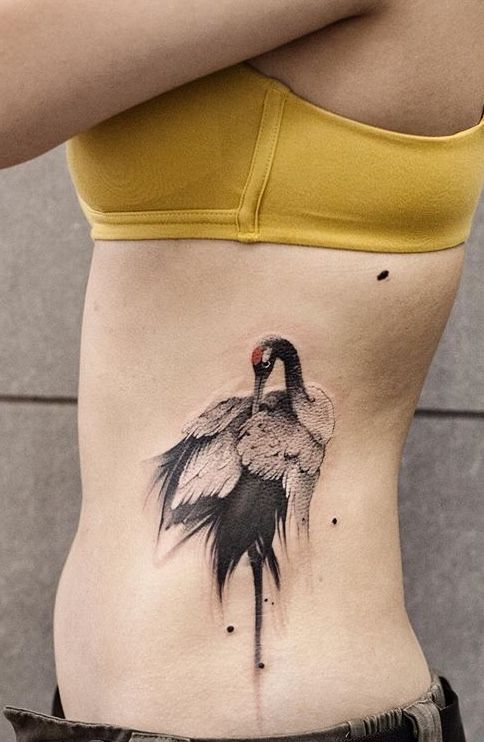 bird tattoos for women on rib