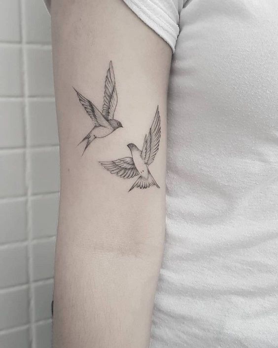 bird tattoos for women on arm
