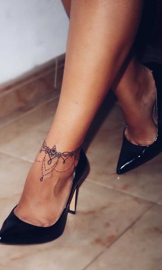 Bracelet tattoos on foot