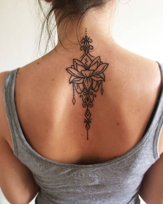 Lotus flower mandala tattoo on back