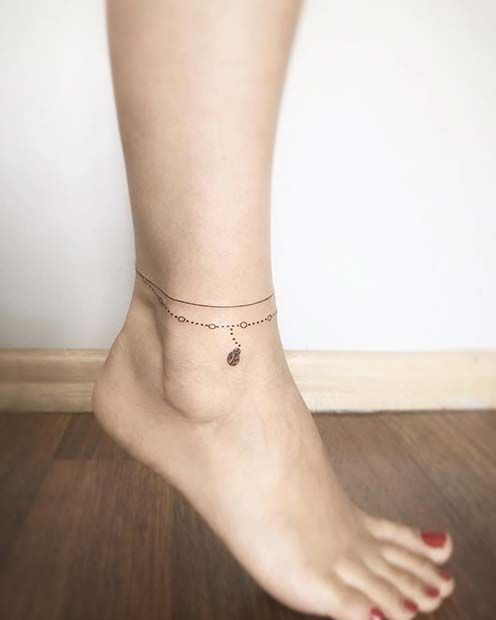 Bracelet tattoos on foot