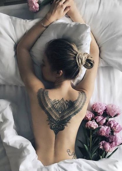 upper back flower tattoo