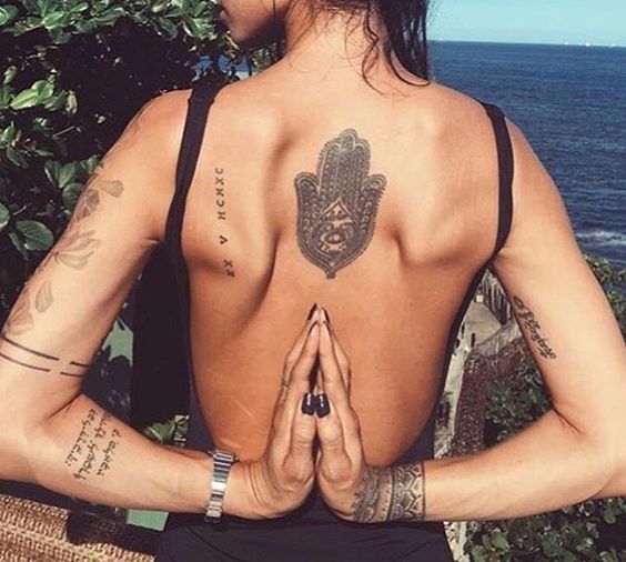 Hamsa Hand tattoo on back