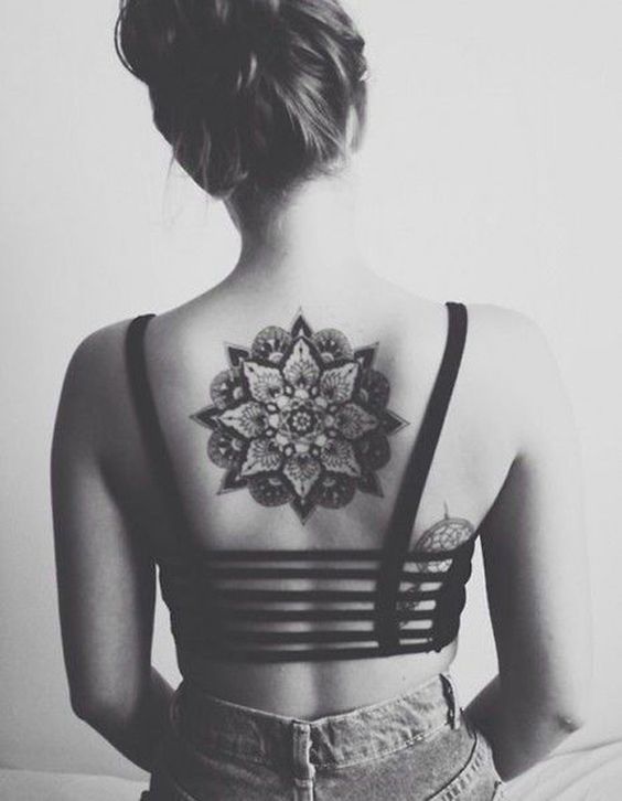 upper back flower tattoo