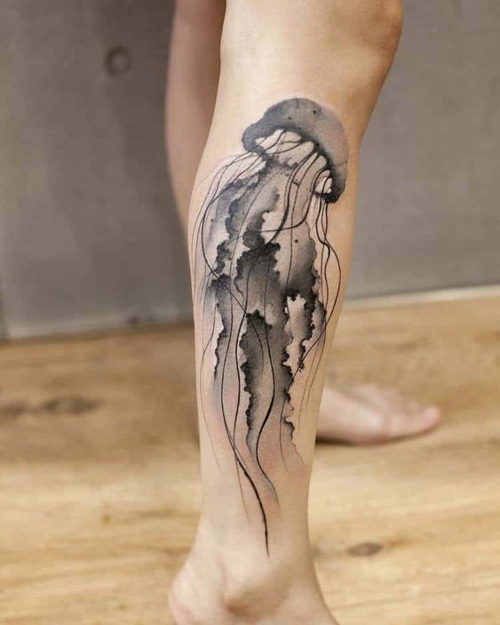 jelly fish tattoo on calf