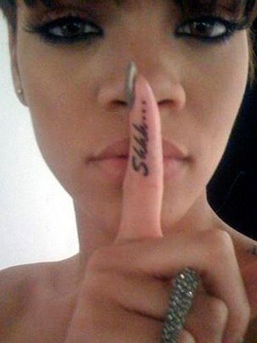 Shhh on her Finger
